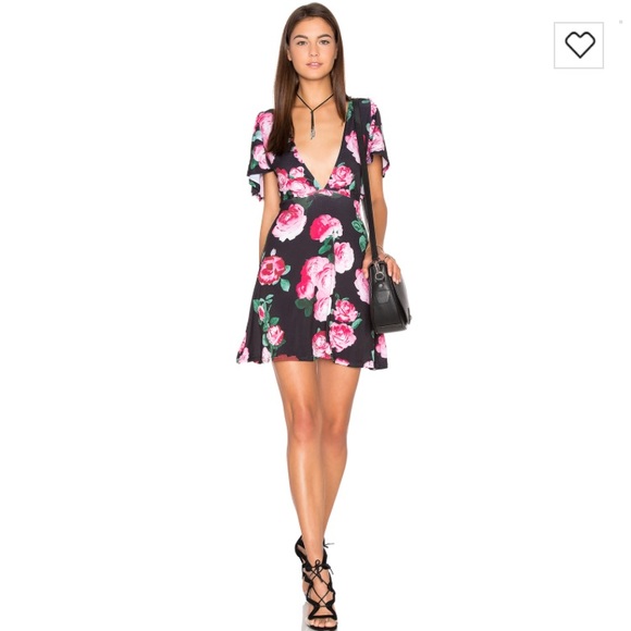 Low V-neck dress - Picture 1 of 7